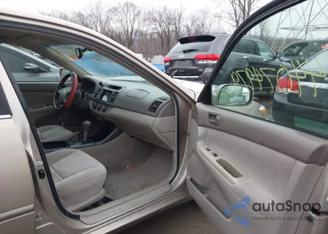 2002 Toyota Camry Le from USA, damaged, VIN 4T1BE32K72U073996